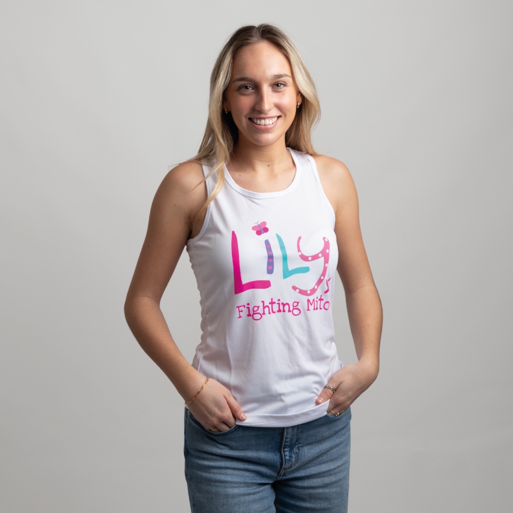 A smiling woman in a white vest featuring the Lily Foundation logo and fighting mito underneath.