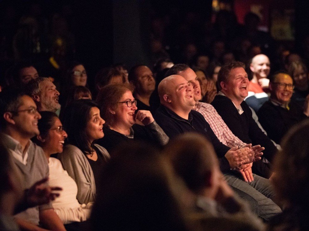 Lily Comedy Night 2026 - Save the date - A crowd of people laughing whilst at the Lily Foundation Comedy Night