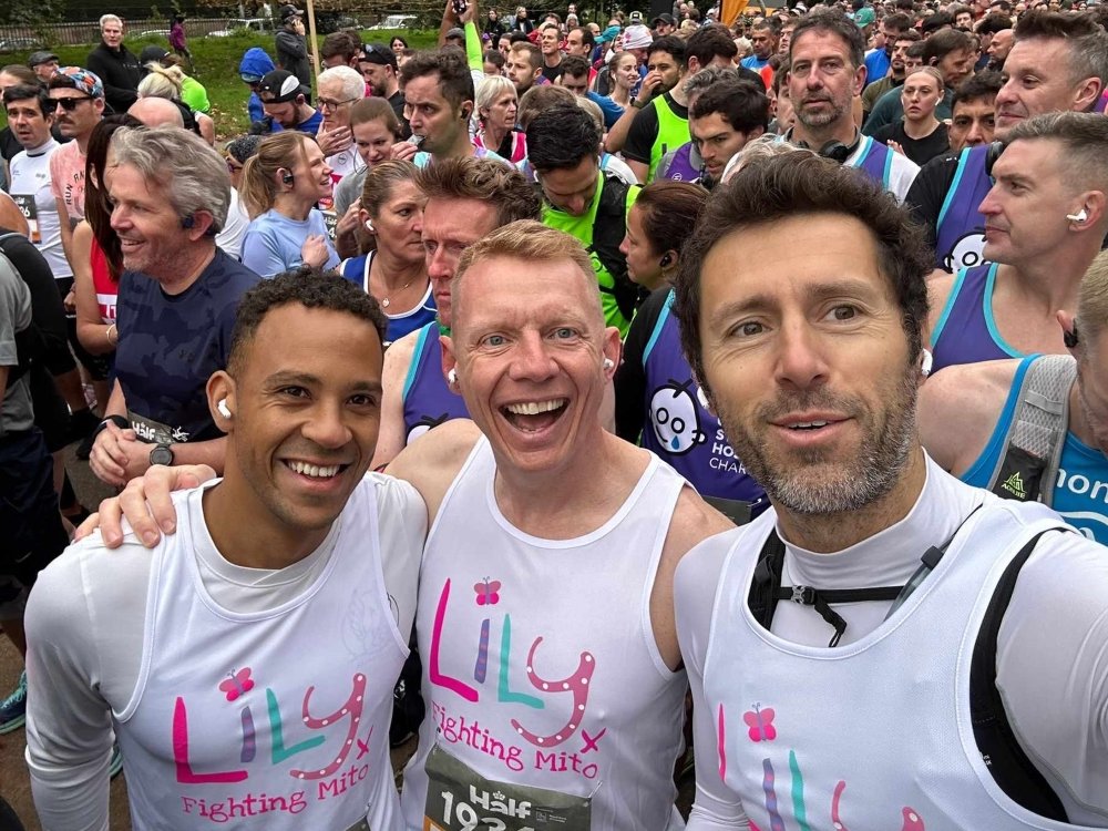 Royal Parks Half Marathon 2025 - Three men in Lily Foundation tops smiling at the Royal Parks Half Marathon in London