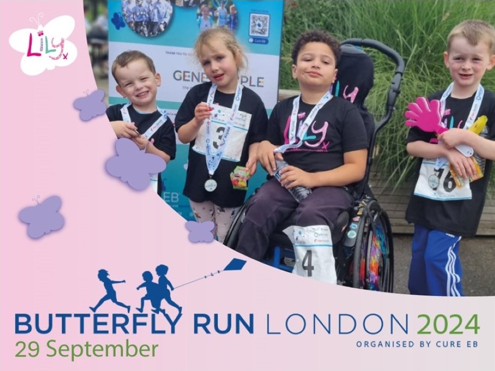 Butterfly Run 2024 - Four children proudly show off their medals, one is in a wheelchair