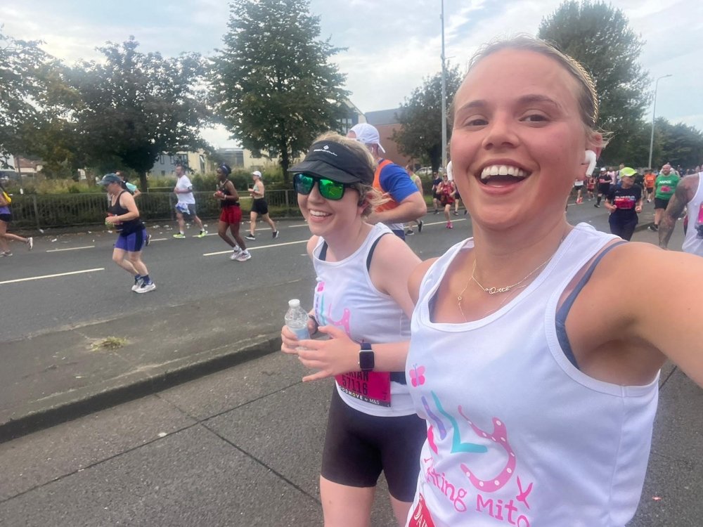 Hackney Half Marathon 2025 - Two women in Lily tops running and smiling