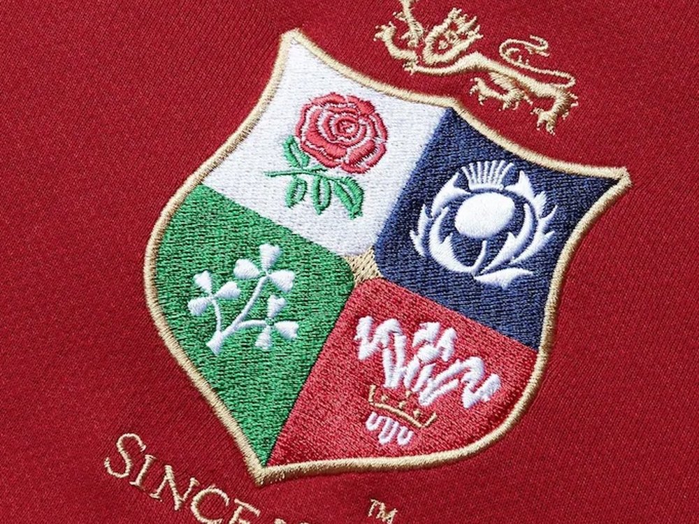 An Evening with the Lions Legends 2025 - British & Irish Rugby Lions logo on a red shirt