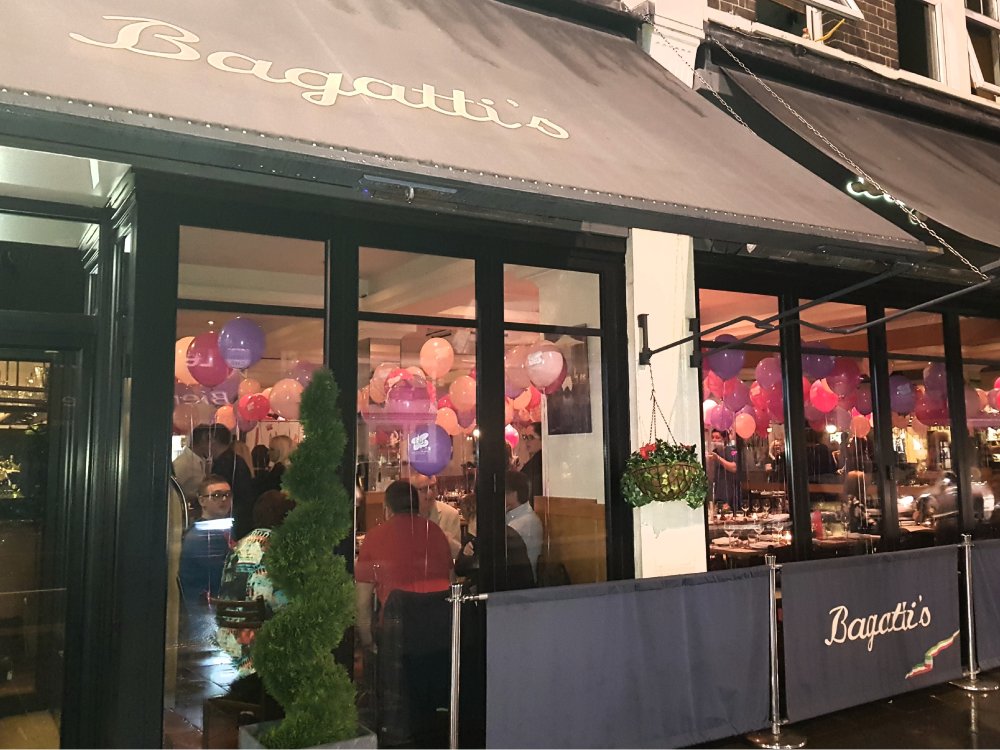 Lily Italian Night at Bagatti’s 2025 - The front of Bagatti's restaurant, with Lily Foundation balloons inside