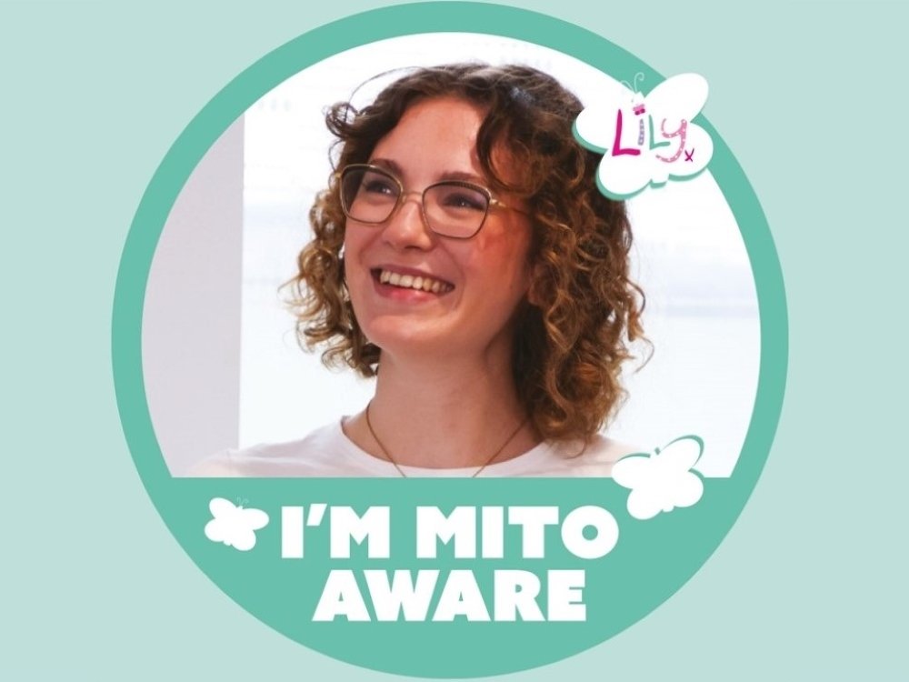 Image of a smiling lady inside a Twibbon with the words 'I'm mito aware'