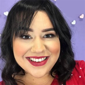 Samantha Josey, Smiling lady with brown shoulder length hair and red lipstick