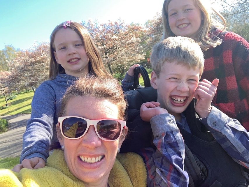 Happy family, outside in the sunshine