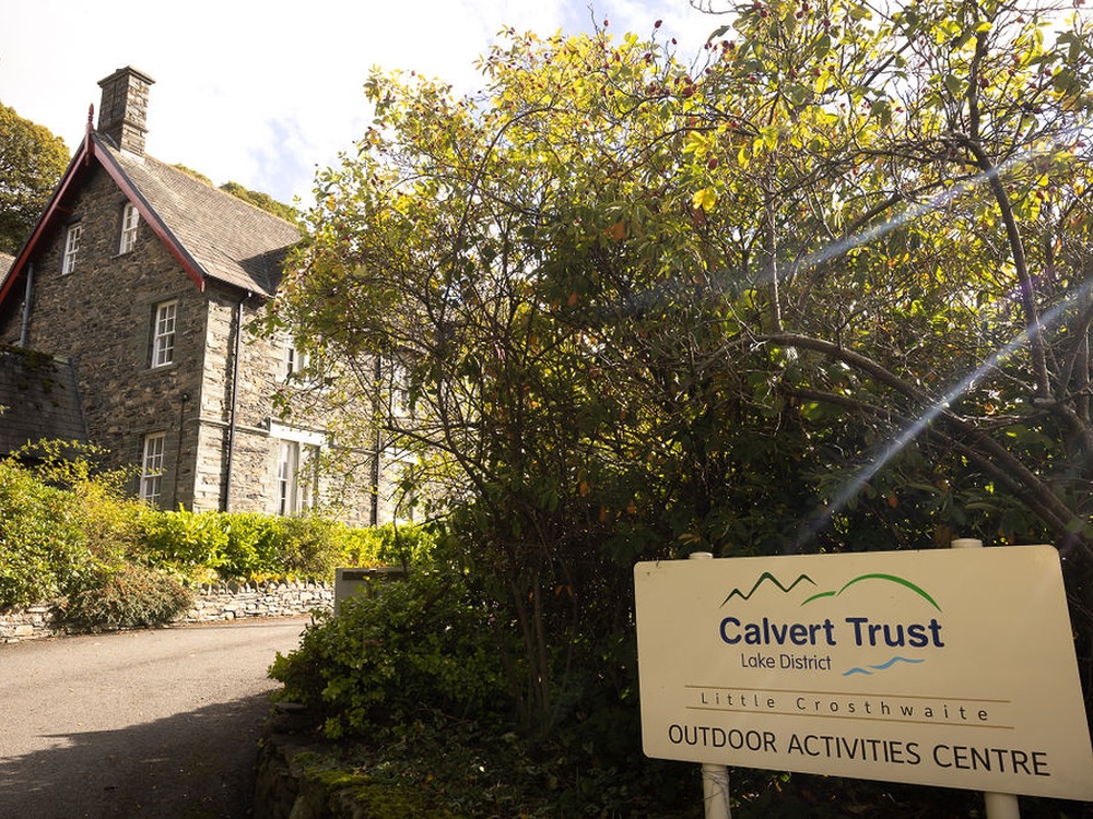 The driveway and sign leading up to the Calvert Trust near Keswick, Cumbria