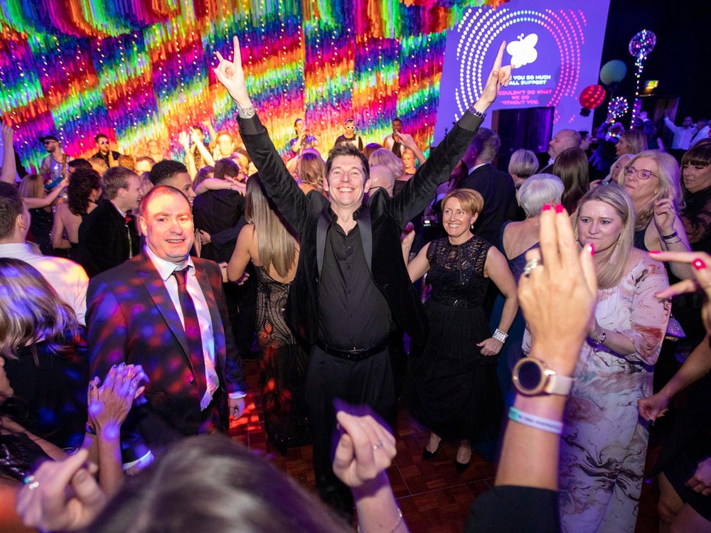 Guests in their party clothes on the dancefloor