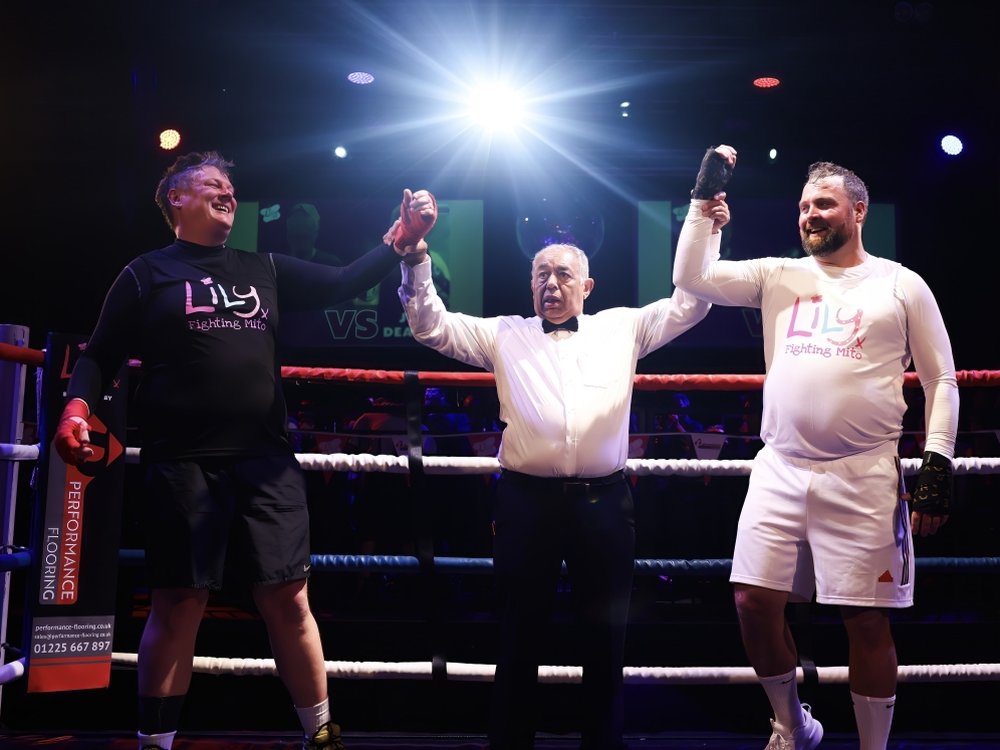 Laughter and left hooks – Lily nights to remember - Two boxers in the ring with the ref at Lily Fight Night at Clapham Grand