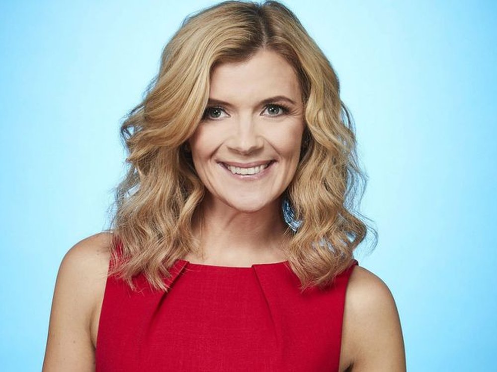 Welcome to Lily, Jane Danson! - Coronation Street actor Jane Danson wearing a red sleeveless top and smiling against a blue background